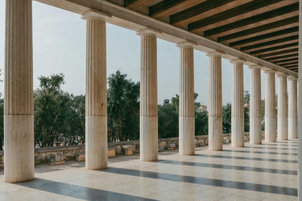 Elegant marble columns in Athens showcasing ancient Greek architecture.